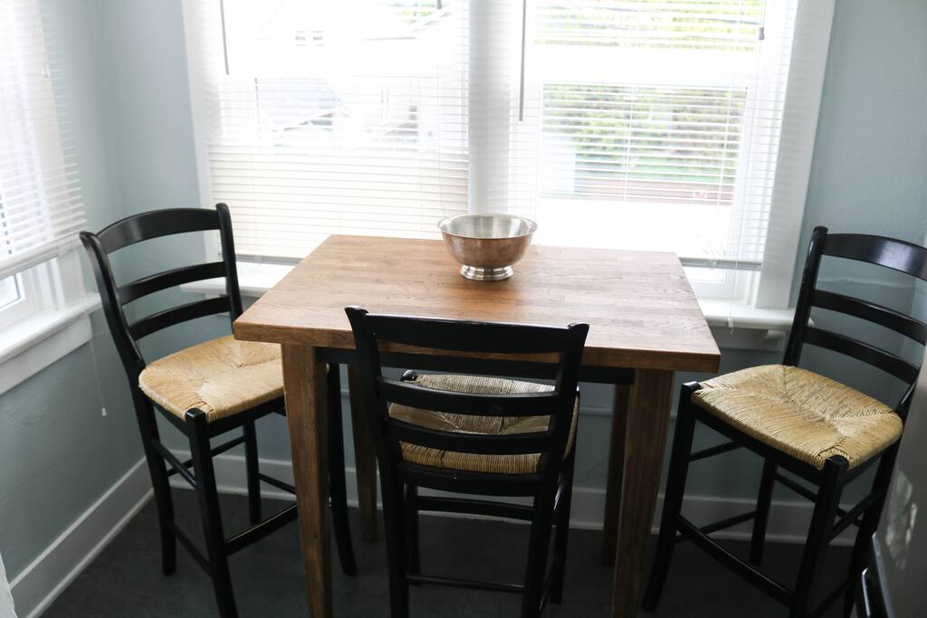 A small breakfast nook in the kitchen; a perfect place for your morning cup.