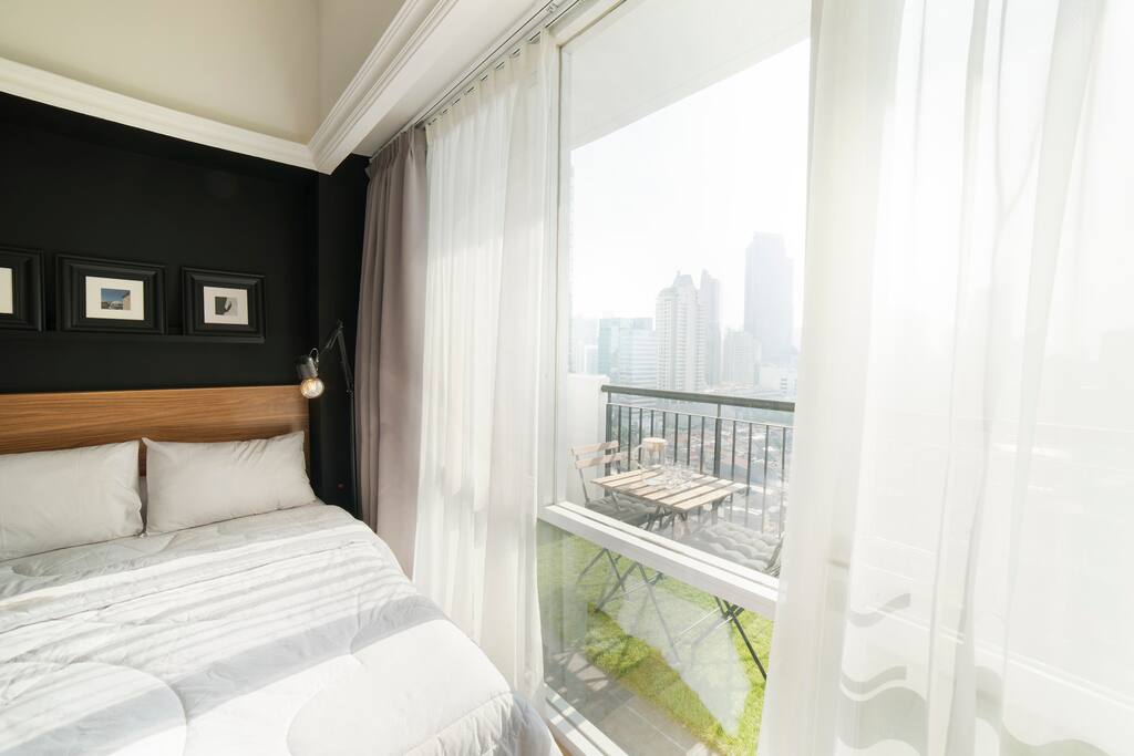 View from bedroom (1). Curtain: Fabric Blackout curtain to reduce amount of heat that is transferred via windows by up to 90%.
