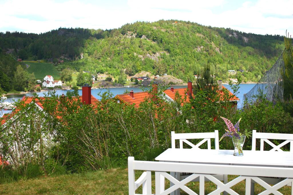 Cozy garden with partio and two dining tables, amazing view