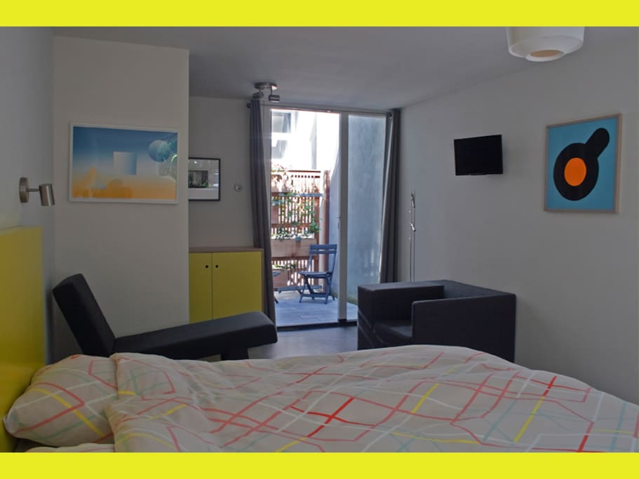 The 'yellow' room is an attractive, quiet bedroom with double bed, sofa and armchair.