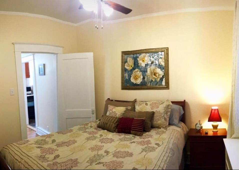 Queen size bed in bedroom #1.