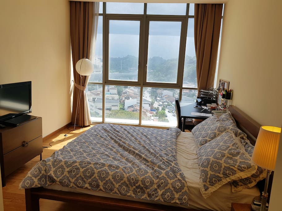 Master's Bedroom with queen size bed with TV and chromecast-ready. This bedroom is available for use for 4 guests and above only.
Great view of the city too!