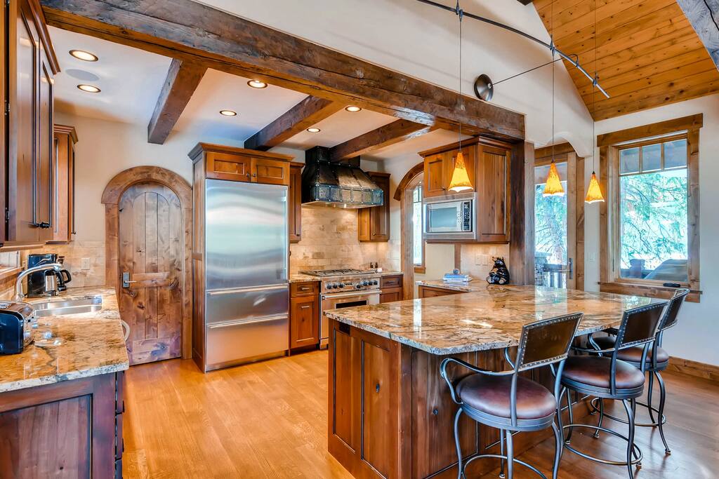 Gourmet Kitchen with Island Seating and High End Appliances