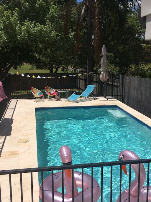 Relax on the deck overlooking the pool
