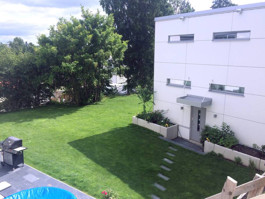 Own small house in shared garden with main house.