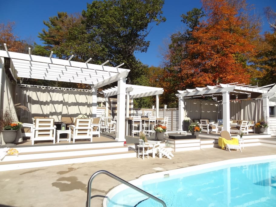 Our beautiful outdoor living space around the heated, saltwater pool.