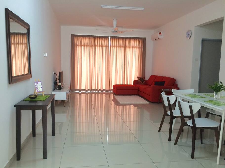 Spacious living hall with mirror and console table at entrance