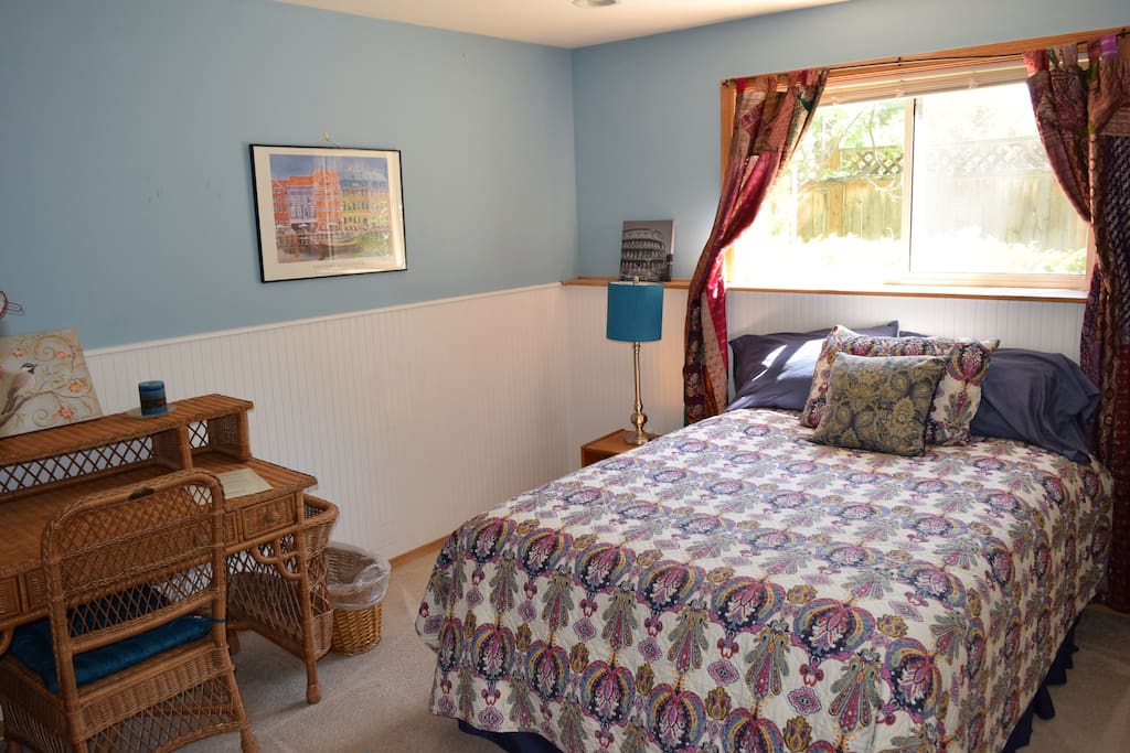This bright room is of the three bedrooms for rent. It has a full size bed, desk, chair and large closet.