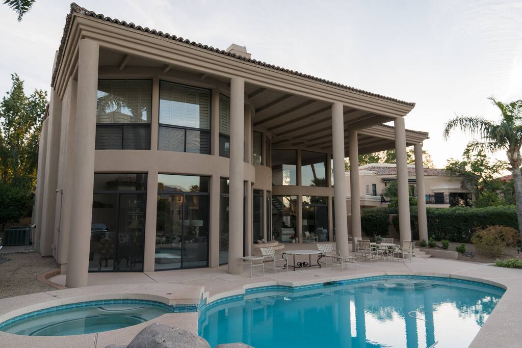 Floor to ceiling windows on entire back of house