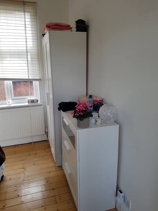 Storage includes wardrobe and chest of draws