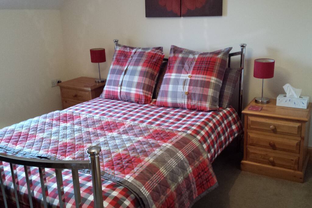 Comfy double beds with fresh décor in every room.