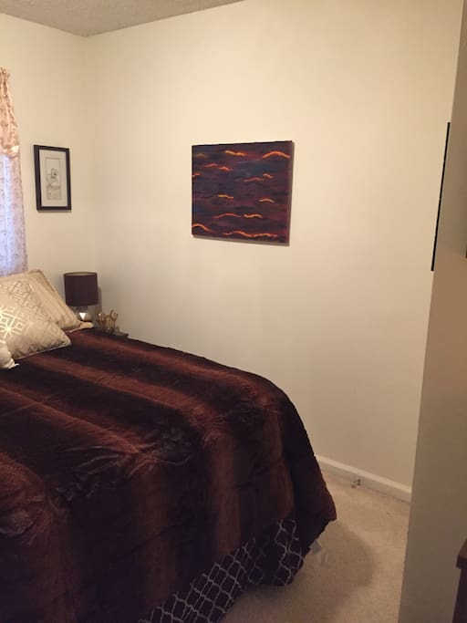 One side of the bed in the private room