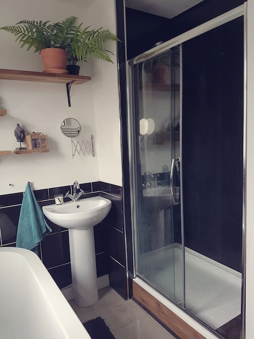 Bathroom with bath and walk in shower