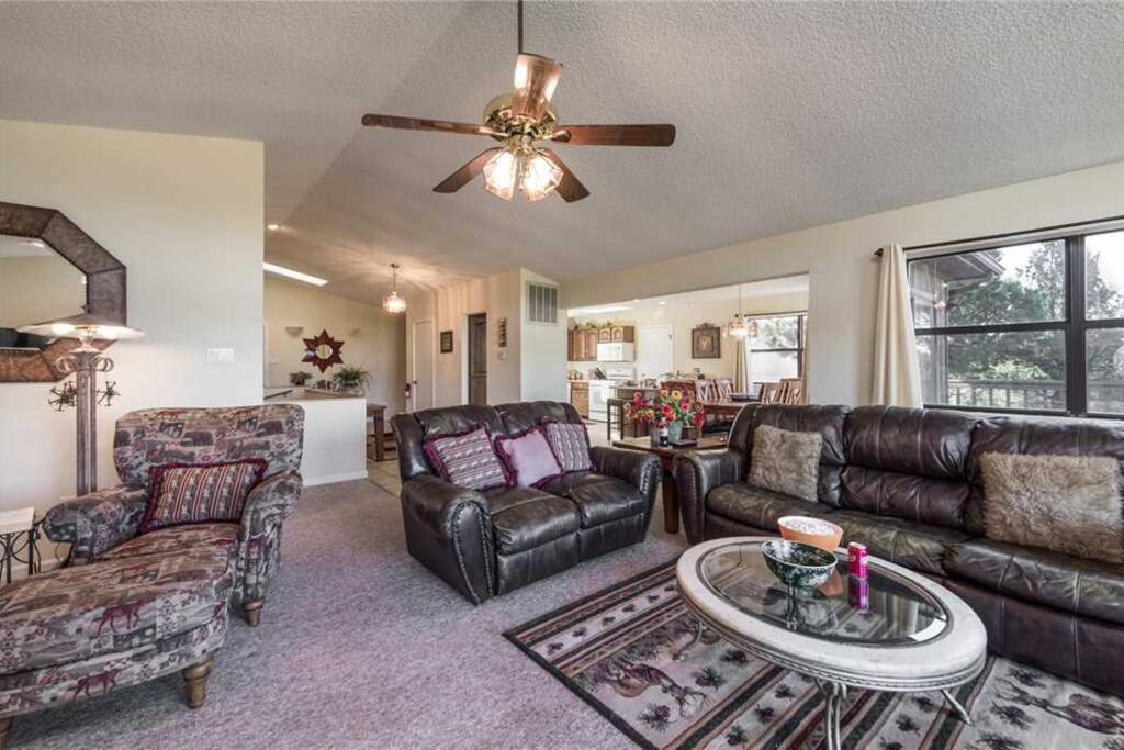 Open Concept Living - The living room and dining area flow easily into the kitchen allowing all of your guests to enjoy each othe