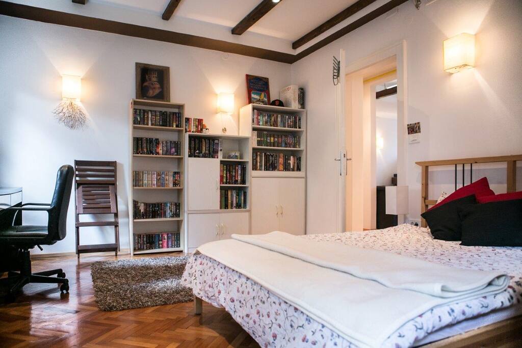 Bedroom No.2 with a tiny library and a feel good work space.
