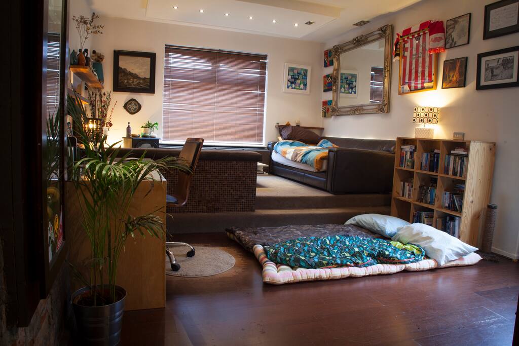 The living space turns into a sleeping spaces for up to three