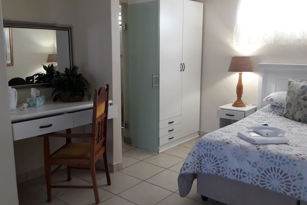 Dressing Table, Chair, Drawers with Hairdryer and Tissues. Make-Up Lights. Wardrobe with Drawers, Hangers, Cloth Racks, Beach Towels, Umbrella and Steam Iron.