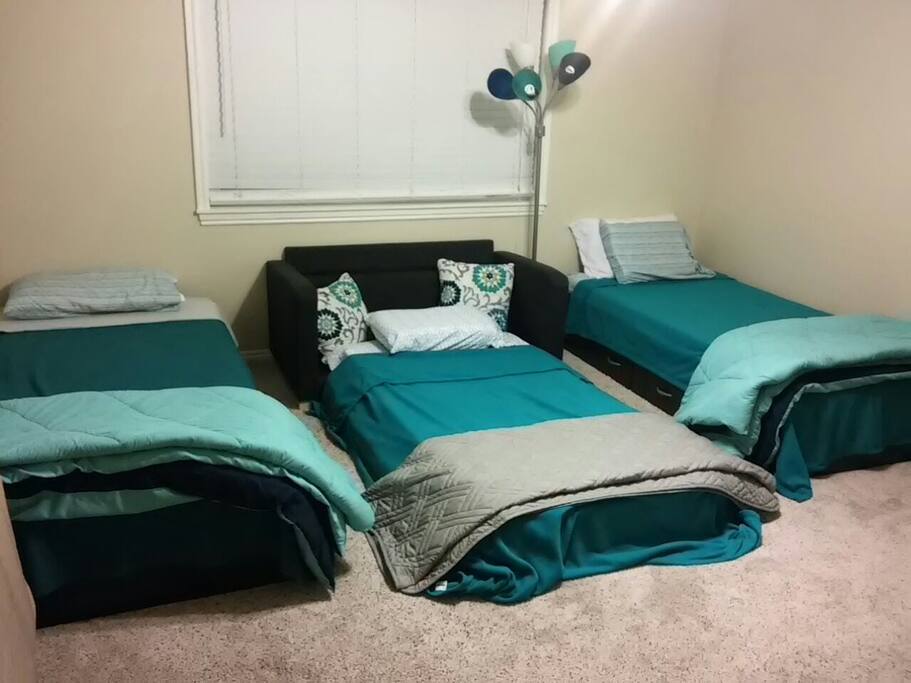 The futon could fit two smaller people but I usually put a twin mattress topper on it.