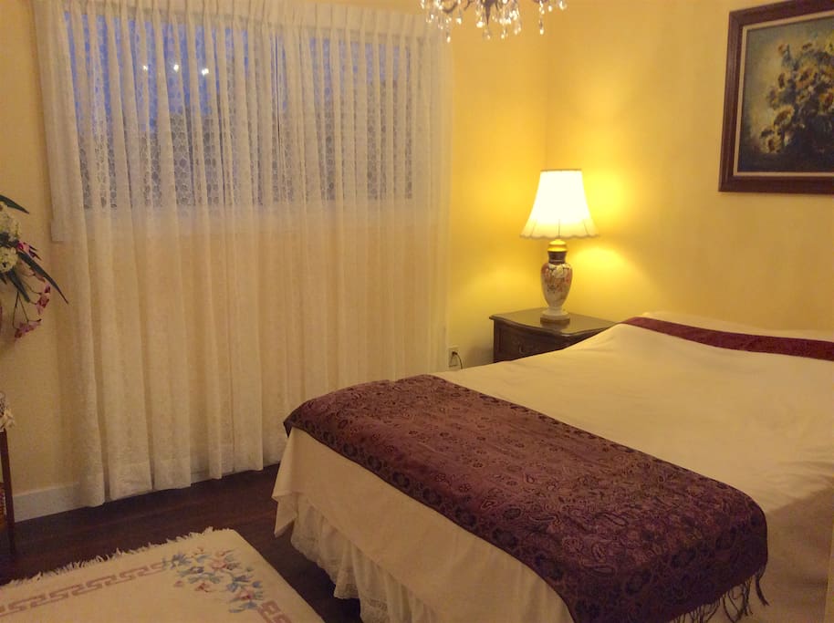 Bedroom B with a queen size bed located on the main floor