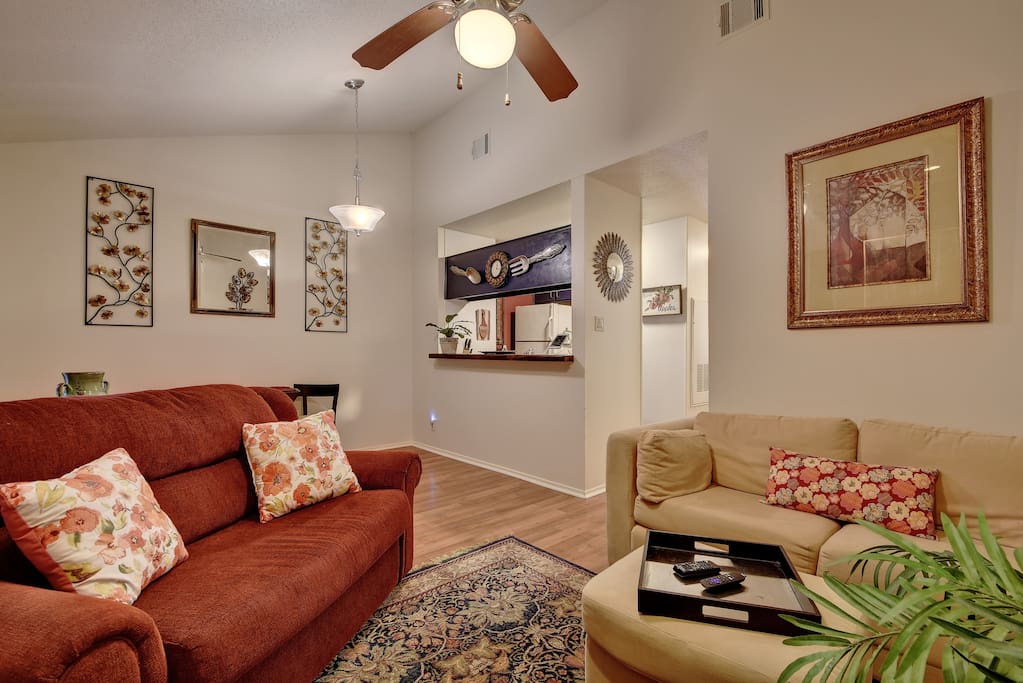 Vaulted ceilings frame the inviting living room