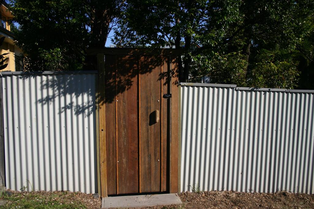 Rear-lane entry with parking available.