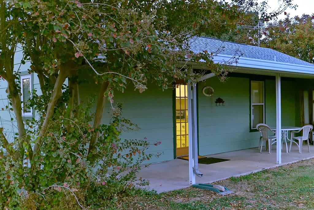 This quiet covered patio entrance is where you'll be watching the world wake up each morning.