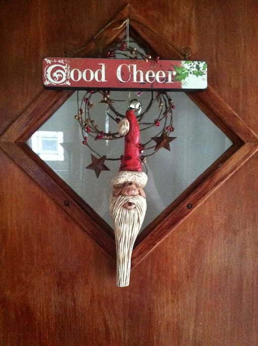 The front door decorated for Christmas.