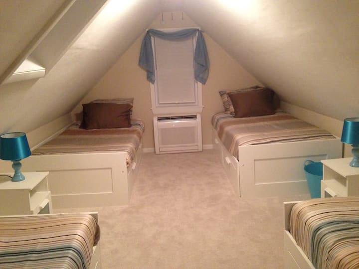 The bunkhouse has 4 convertible twins, ready for the kids and their friends. (The Back bedroom.)