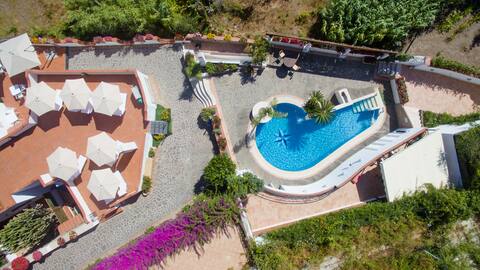 Panoramic villa with swimming pool and outdoor spaces