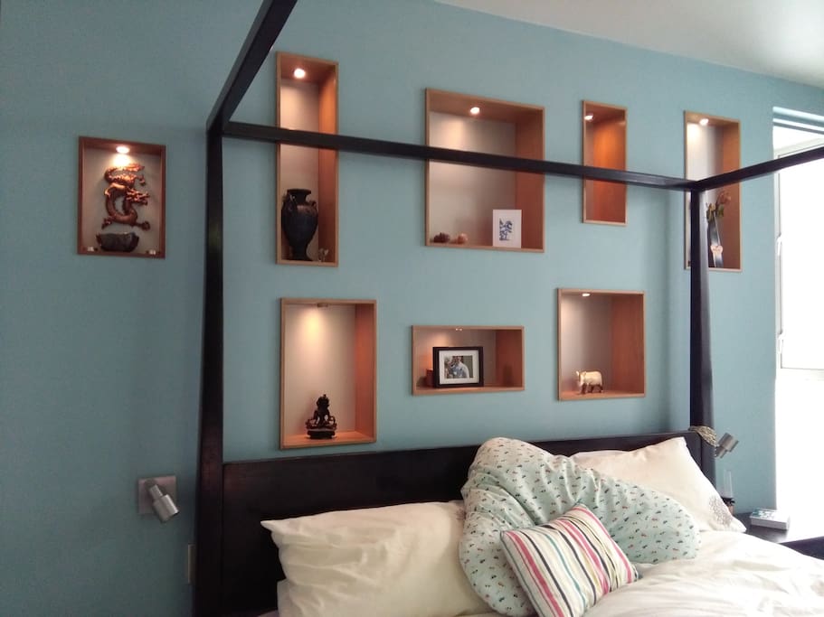 main bedroom with super king size 4-poster bed that looks put onto private deck