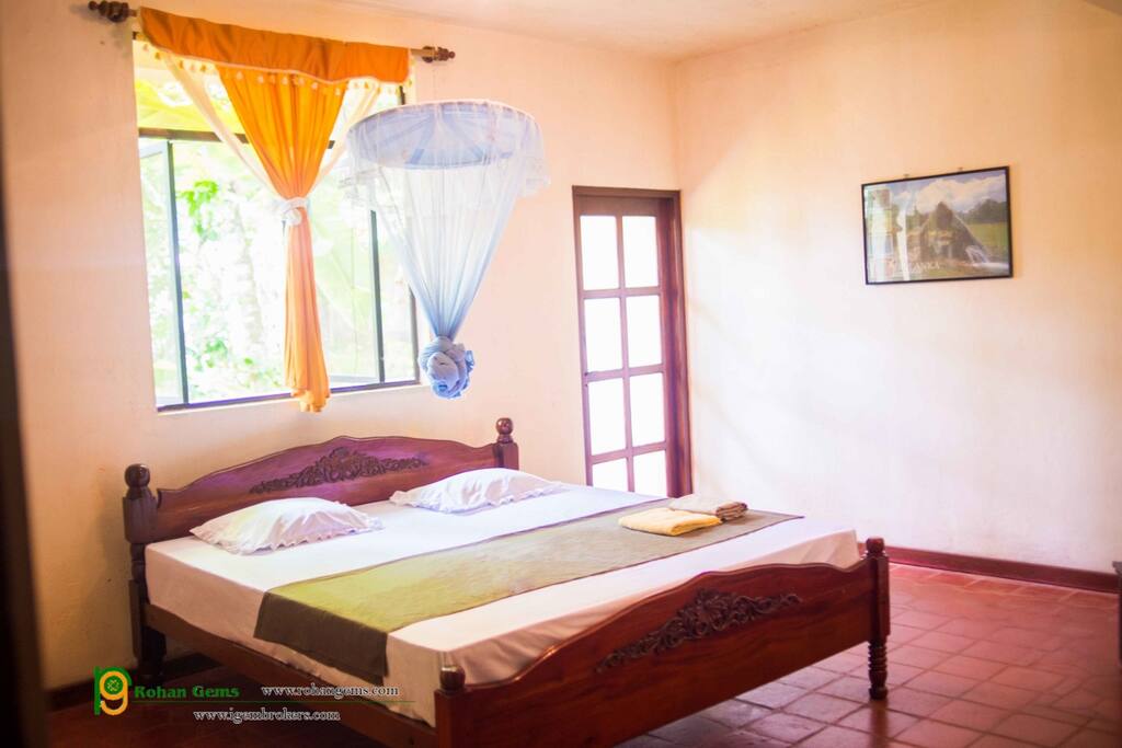 Spacious bedroom with comfy bed