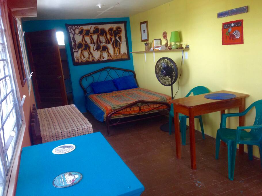 A sweet room with a sunset view and writing desk.