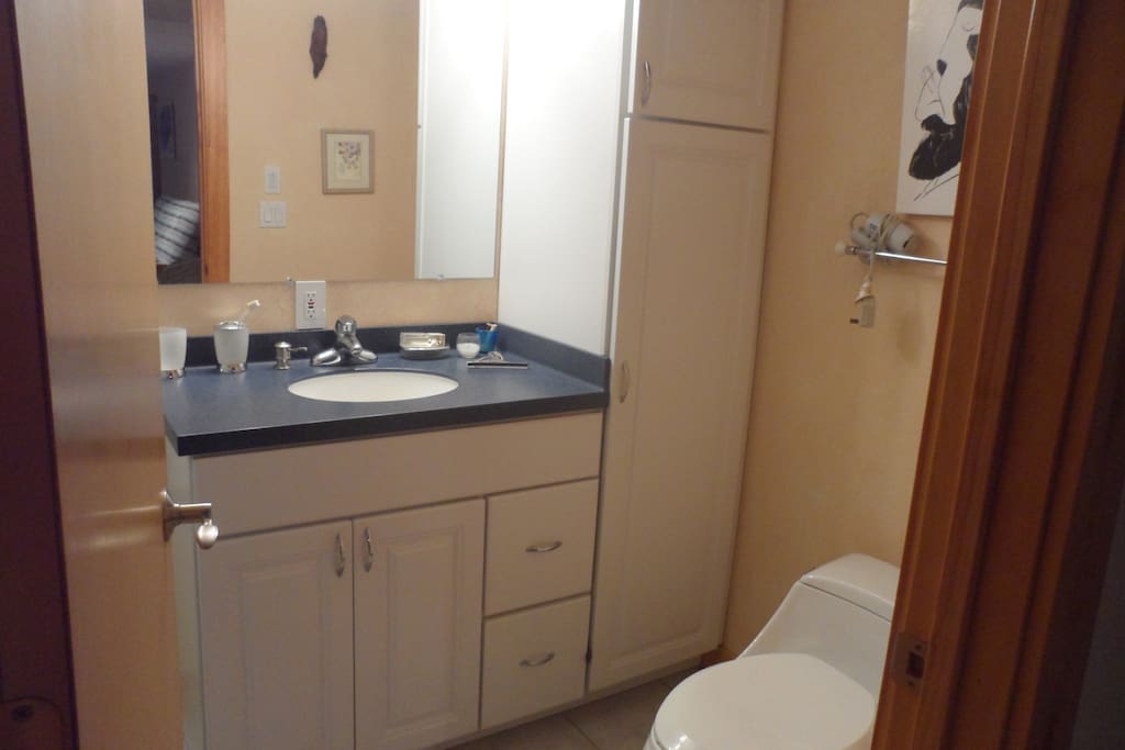 Full bath with shower and bathtub.