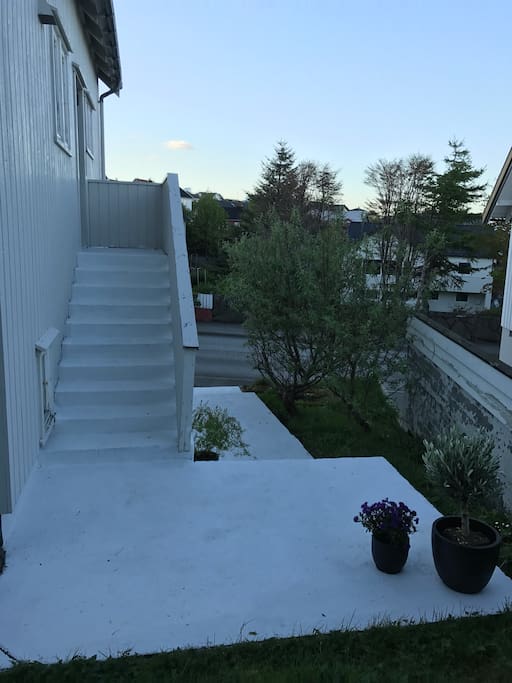Outside the house, stairs to the main door