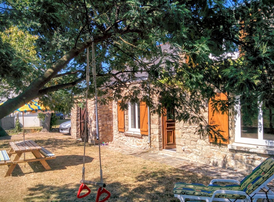 Accès direct au jardin depuis la cuisine ou le salon