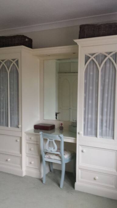 Desk/dressing table. Lots of storage.