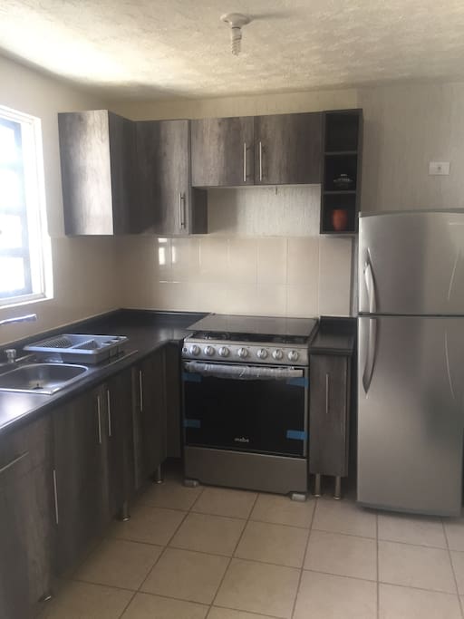 Cocina para que pueda preparar sus alimentos.