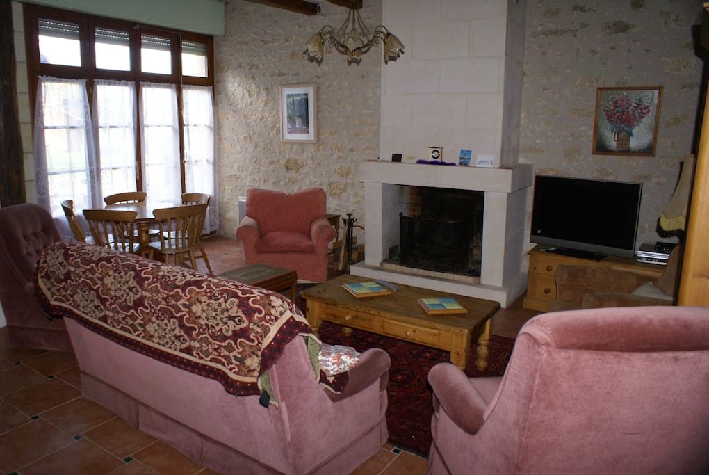 Large living room with log fire, satellite TV, seating for 5