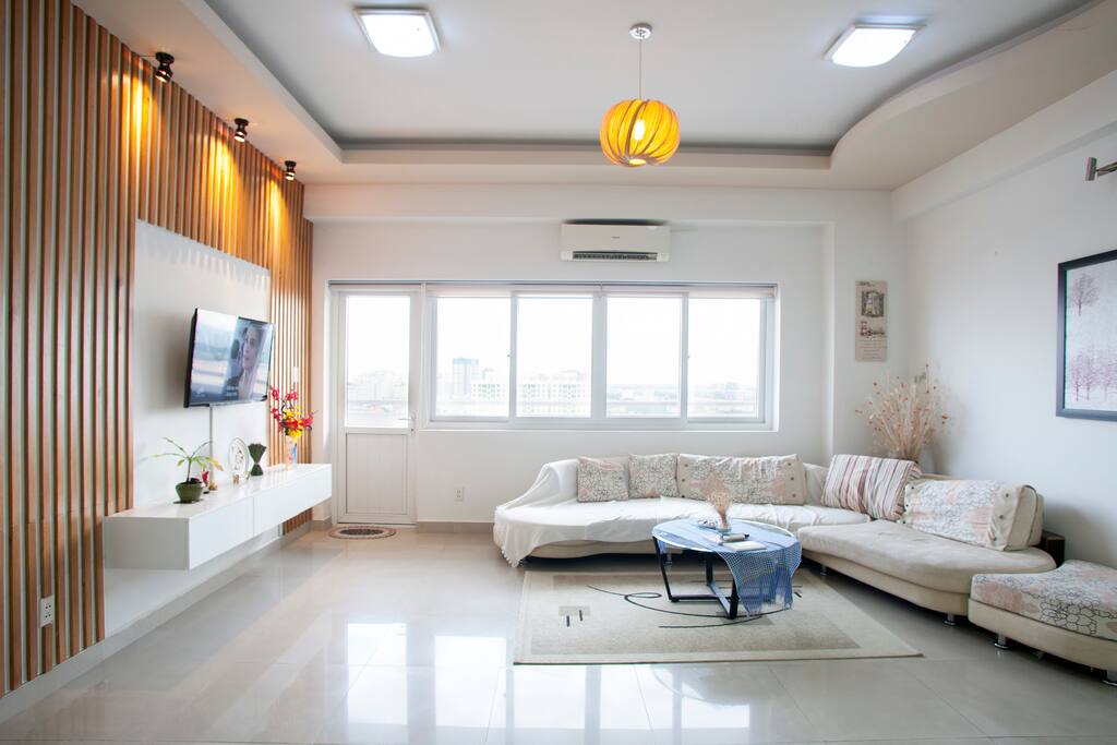 Unit 1 - City View Penthouse on 15th floor: Our spacious and modern living room makes a hangout place