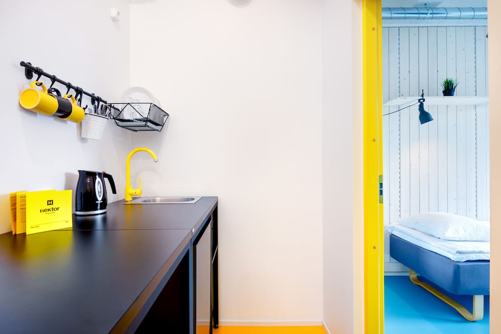 In the 4-room apartment, a small kitchenette with essentials is available.