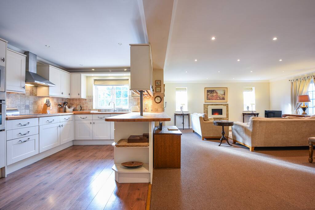View of living room and kitchen from the dining area.