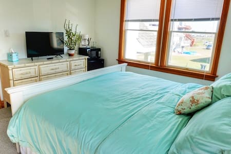 King Bed with Natural Light and Hot Tub