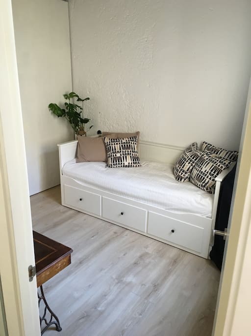 Second bedroom for one or two persons. The white sofa converts easily into a double bed with a with of 160 cm.
