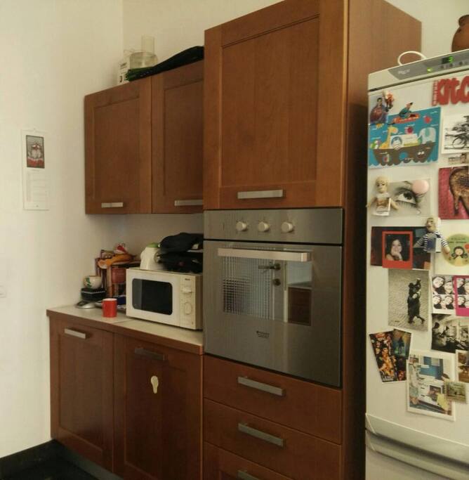 Hungry? The kitchen includes a big space to cook and eat.