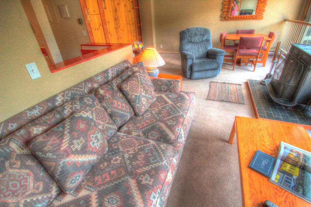 Living Room - The sofa pulls out to a queen size bed to sleep 2 additional people.