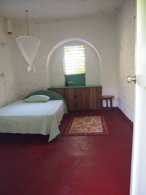 Walking into one of two single bedrooms available at The River Lodge.