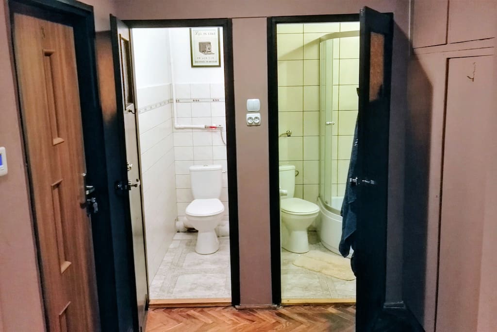 Bathroom with toilet, and separated toilet in common area.