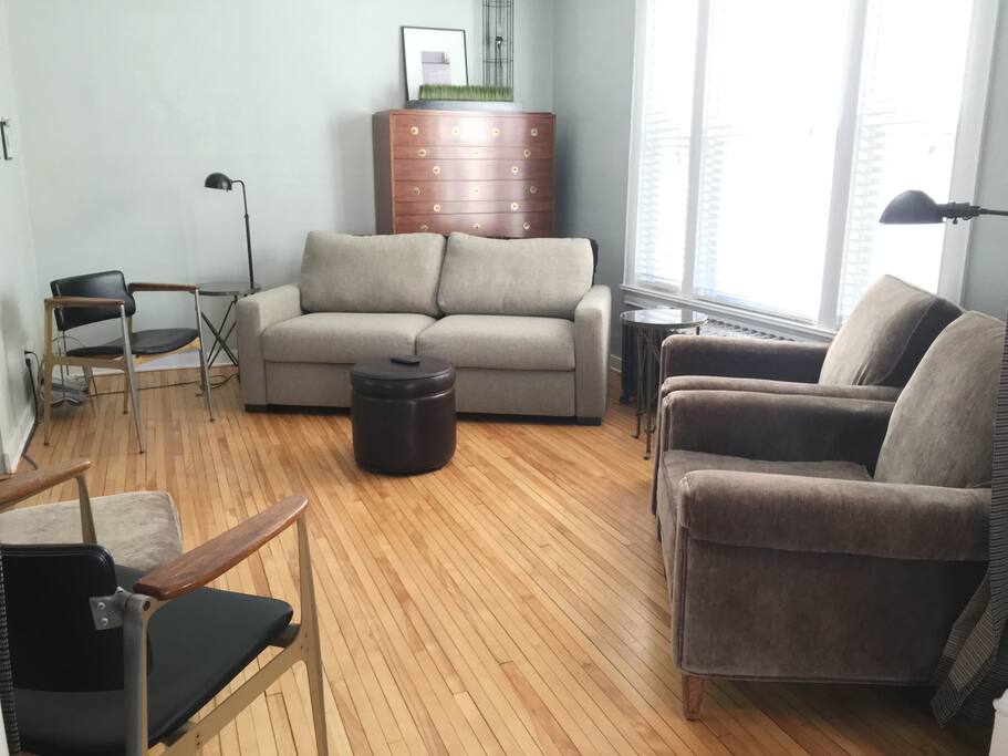 One of two open floor plan living spaces. This media room contains a quality queen sized sofa bed and television.