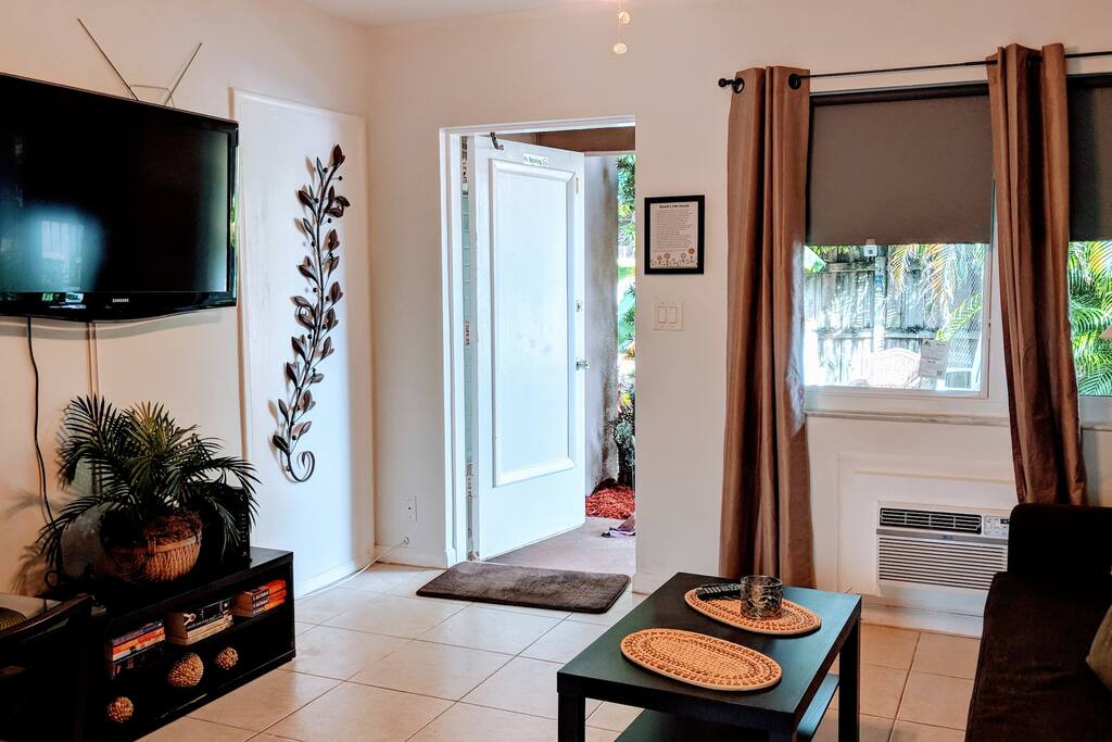 42" tv w steaming w garden view.