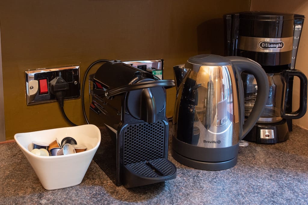 The Nespresso coffee machine with nespresso milk frother and pods